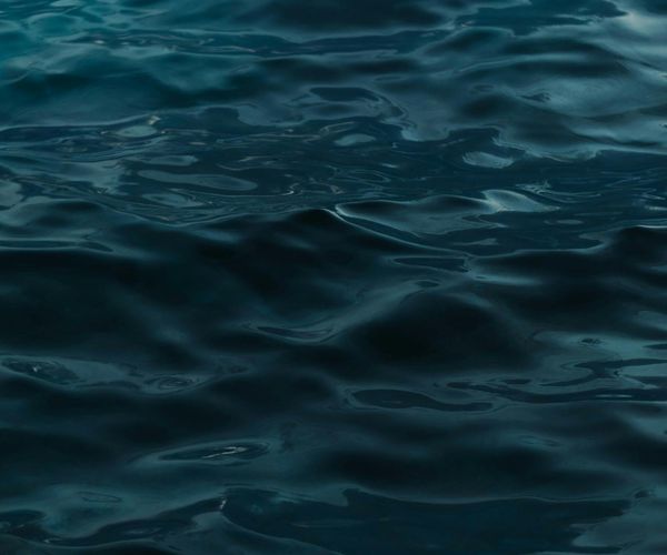 Abstract gentle waves representing the flow of breath.